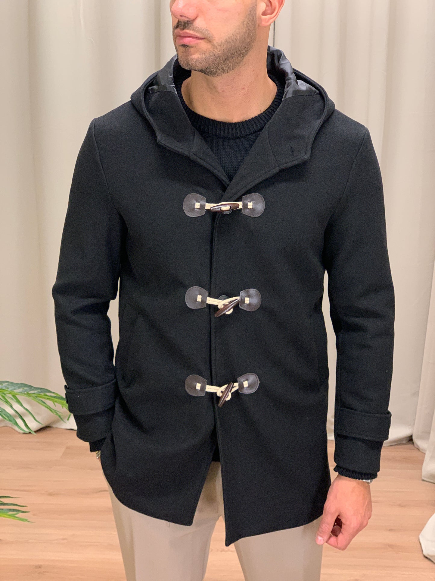 Cappotto Montgomery con cappuccio col. Nero